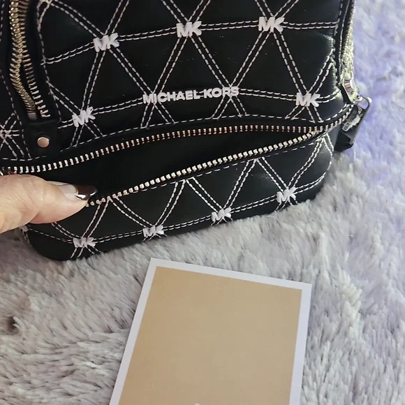 Michael Kors Black and White Quilted Backpack - Picture 5 of 12